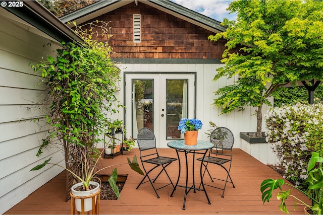 wooden terrace featuring french doors