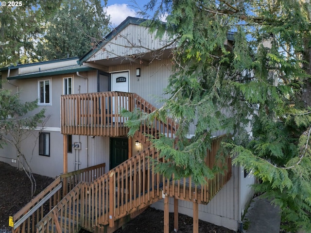 1502 NE 72nd St, Vancouver, WA 98665 - rear view of house with stairs and a wooden deck