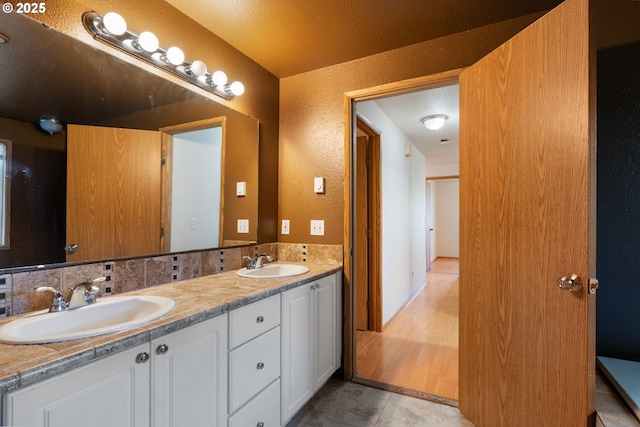 1502 NE 72nd St, Vancouver, WA 98665 - full bathroom with a textured wall, double vanity, and tile patterned flooring