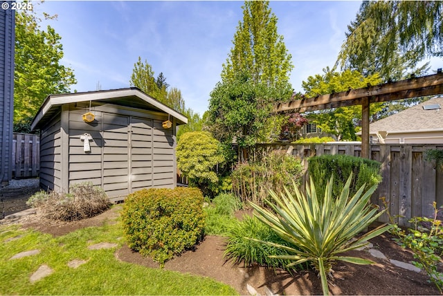 view of shed with fence
