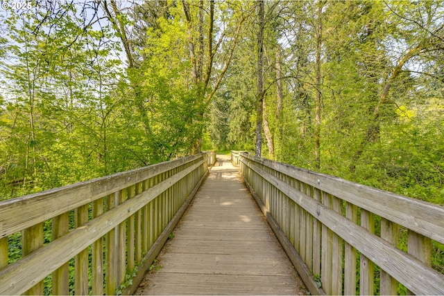view of home's community featuring a wooded view