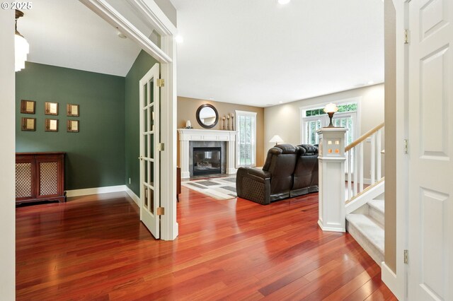 20817 NE 101st Ct, Battle Ground, WA 98604 - living room with wood finished floors, stairway, and a fireplace