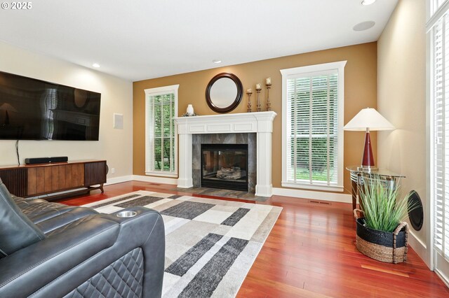 20817 NE 101st Ct, Battle Ground, WA 98604 - living room with wood finished floors, a fireplace, recessed lighting, and plenty of natural light