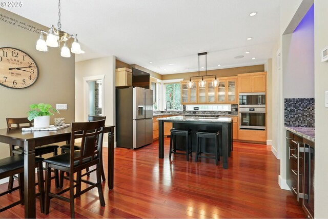 20817 NE 101st Ct, Battle Ground, WA 98604 - dining space featuring a chandelier, dark wood-type flooring, and recessed lighting