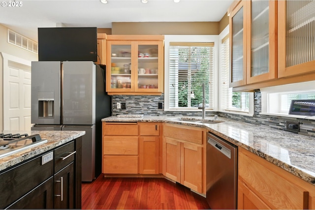 20817 NE 101st Ct, Battle Ground, WA 98604 - kitchen featuring stainless steel appliances, decorative backsplash, dark wood finished floors, glass insert cabinets, and recessed lighting