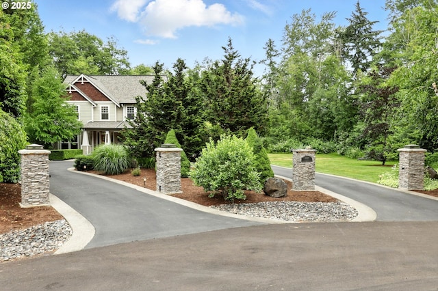 20817 NE 101st Ct, Battle Ground, WA 98604 - view of front of house with driveway, roof with shingles, and a front yard