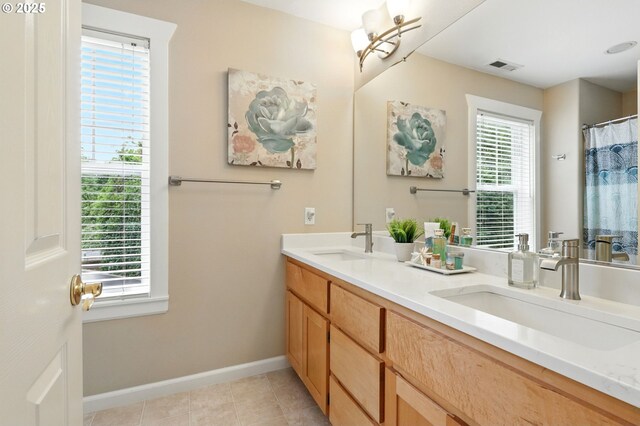 20817 NE 101st Ct, Battle Ground, WA 98604 - full bath with double vanity, tile patterned flooring, and a shower with curtain