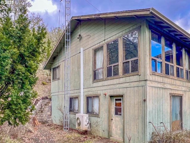 view of home's exterior featuring ac unit