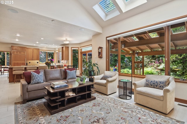 17514 Brookhurst Dr, Lake Oswego, OR 97034 - living room with a skylight, recessed lighting, and vaulted ceiling