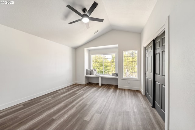 5958 SE 16th Loop, Gresham, OR 97080 - unfurnished bedroom featuring wood finished floors, lofted ceiling, baseboards, ceiling fan, and a closet