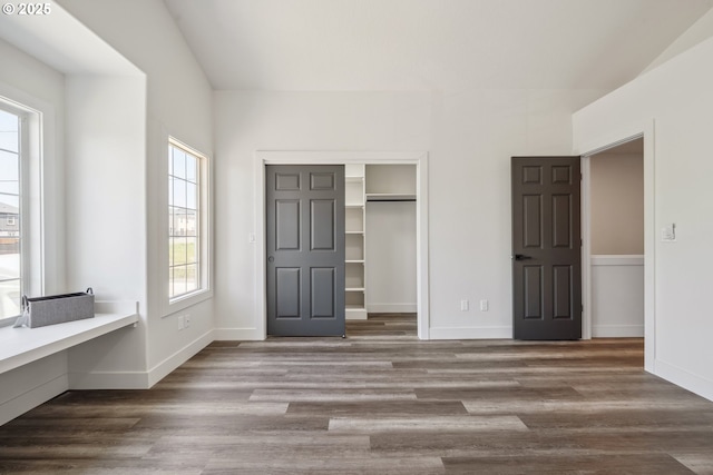 5958 SE 16th Loop, Gresham, OR 97080 - unfurnished bedroom featuring wood finished floors, baseboards, and a closet