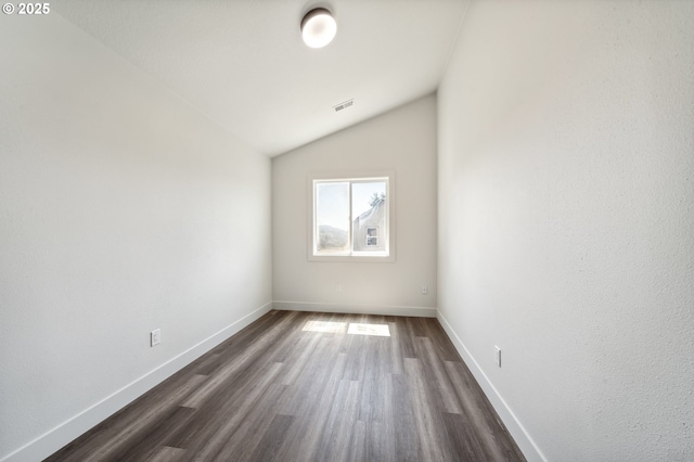 5958 SE 16th Loop, Gresham, OR 97080 - unfurnished room with lofted ceiling, dark wood-style floors, and baseboards
