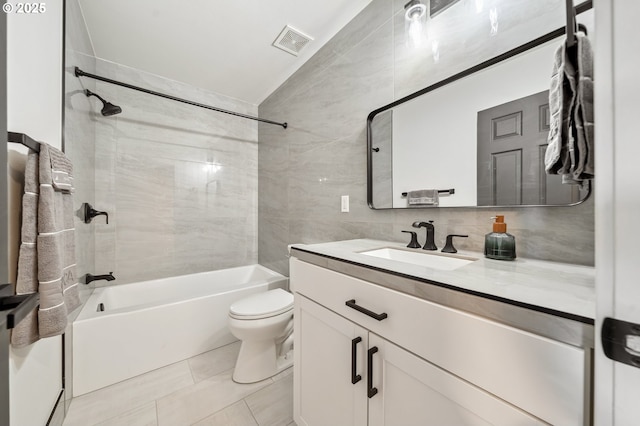 5958 SE 16th Loop, Gresham, OR 97080 - bathroom with toilet,  shower combination, vanity, tile walls, and tile patterned flooring