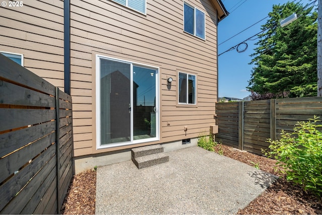 5958 SE 16th Loop, Gresham, OR 97080 - back of property featuring a patio and a fenced backyard