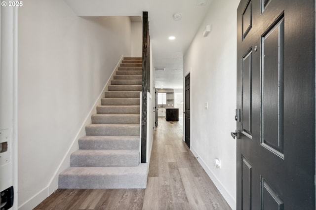 5958 SE 16th Loop, Gresham, OR 97080 - foyer entrance with stairway, wood finished floors, and baseboards