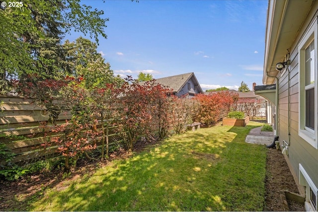 view of yard featuring a fenced backyard