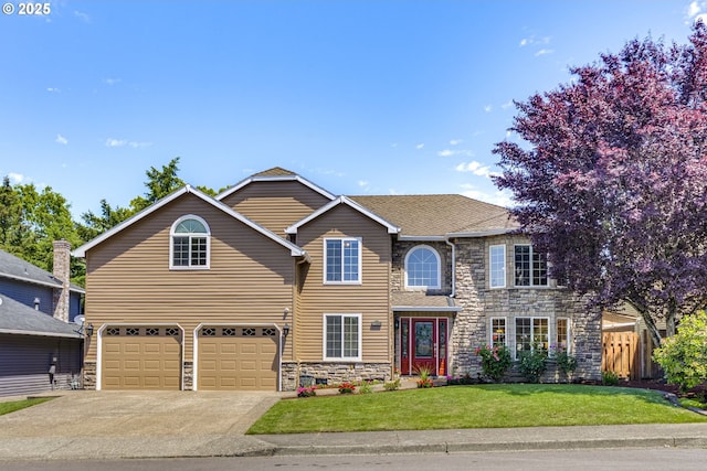 17865 NW Elk Meadow Ln, Portland, OR 97229 - traditional-style house with stone siding, a garage, and driveway