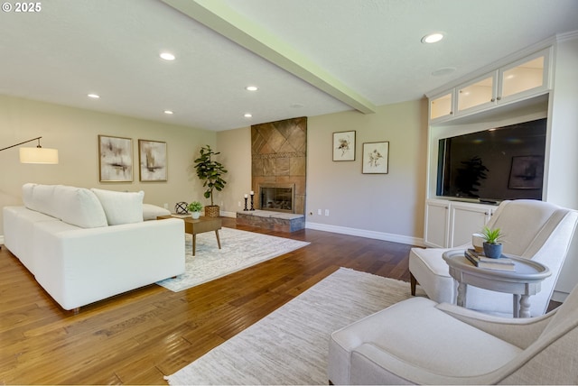 17865 NW Elk Meadow Ln, Portland, OR 97229 - living area featuring baseboards, a fireplace, wood finished floors, and recessed lighting