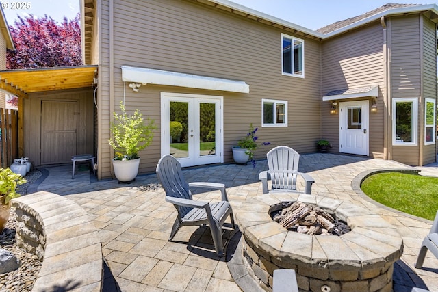 17865 NW Elk Meadow Ln, Portland, OR 97229 - view of patio with french doors and an outdoor fire pit