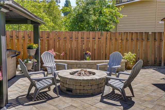 17865 NW Elk Meadow Ln, Portland, OR 97229 - fenced backyard with a fire pit and a patio area