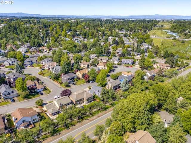 17865 NW Elk Meadow Ln, Portland, OR 97229 - aerial perspective of suburban area featuring a mountain backdrop
