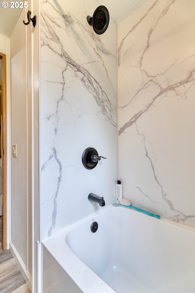 bathroom featuring  shower combination