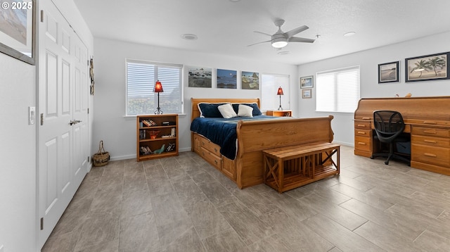 1307 Moore St Unit 704, Brookings, OR 97415 - bedroom with baseboards, a ceiling fan, a closet, wood finish floors, and recessed lighting