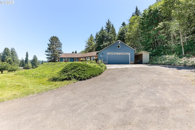 37330 SE Dodge Park Blvd, Boring, OR 97009 - ranch-style house featuring asphalt driveway, an attached garage, and a carport