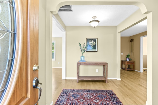37330 SE Dodge Park Blvd, Boring, OR 97009 - entrance foyer featuring light wood finished floors, arched walkways, and baseboards