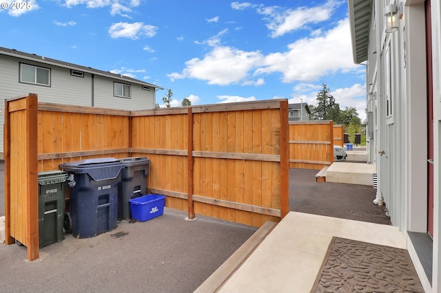 view of patio / terrace featuring fence