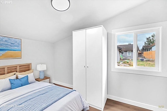 328 18th Ave, Longview, WA 98632 - bedroom with baseboards, wood finished floors, and a closet