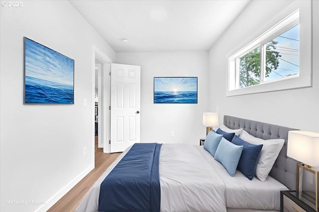 328 18th Ave, Longview, WA 98632 - bedroom featuring wood finished floors and baseboards