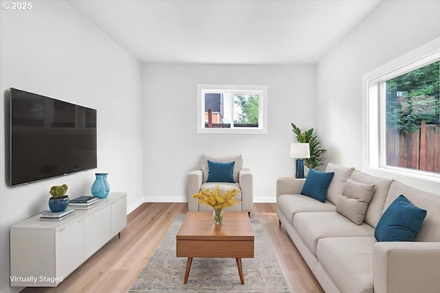328 18th Ave, Longview, WA 98632 - living area featuring healthy amount of natural light, light wood-style flooring, and baseboards