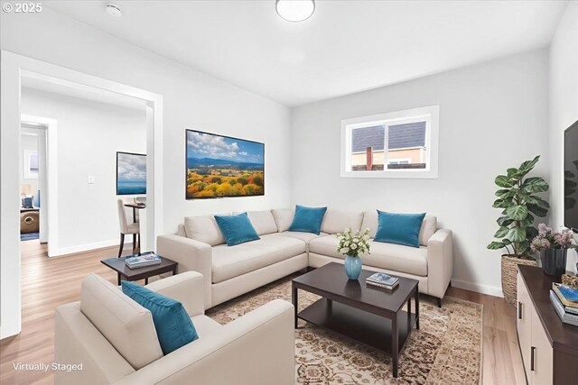 328 18th Ave, Longview, WA 98632 - living room featuring light wood finished floors and baseboards