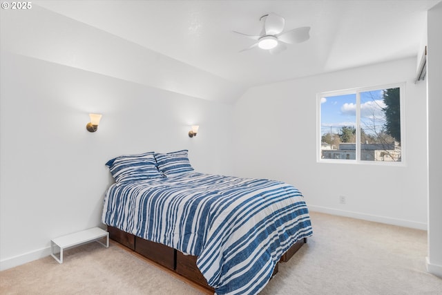 288 NE Hyde Cir, Hillsboro, OR 97124 - carpeted bedroom featuring lofted ceiling, baseboards, and a ceiling fan