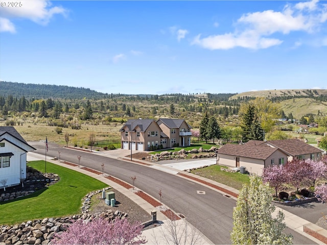130 Ridge Dr, La Grande, OR 97850 - birds eye view of property with a wooded view