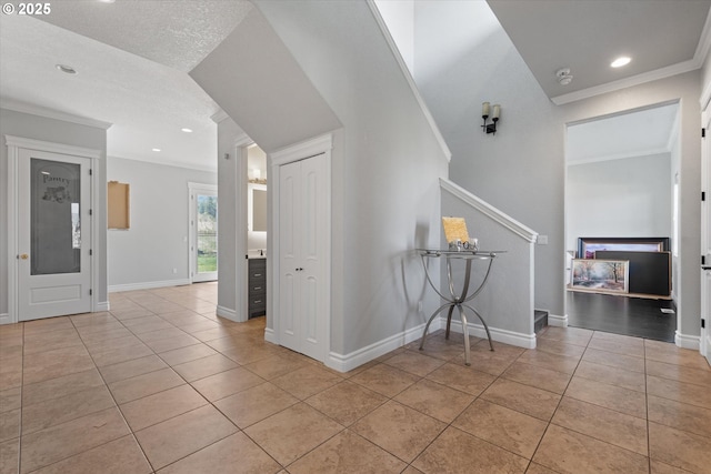130 Ridge Dr, La Grande, OR 97850 - entrance foyer with recessed lighting, crown molding, light tile patterned floors, and stairway