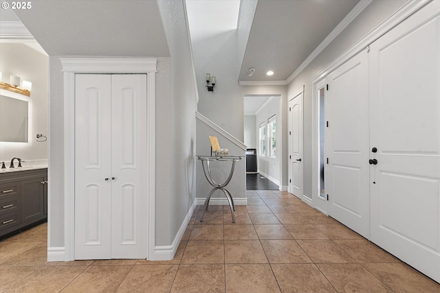 130 Ridge Dr, La Grande, OR 97850 - foyer with crown molding, stairs, light tile patterned floors, baseboards, and recessed lighting