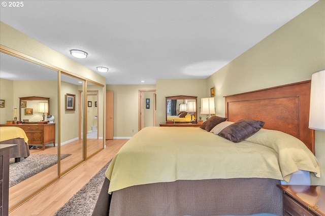15645 NE Russell Pl, Portland, OR 97230 - bedroom with light wood-style floors and recessed lighting