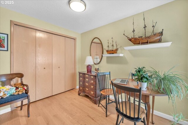 15645 NE Russell Pl, Portland, OR 97230 - living area with light wood-style floors and baseboards