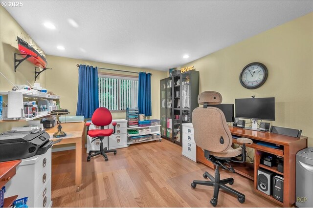 15645 NE Russell Pl, Portland, OR 97230 - home office with wood finished floors and recessed lighting