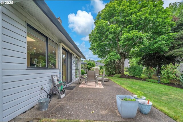 15645 NE Russell Pl, Portland, OR 97230 - view of patio with outdoor dining area