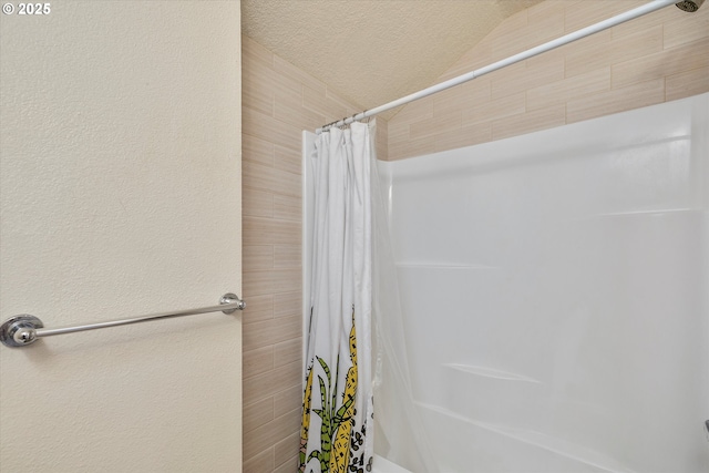 bathroom with a shower with curtain