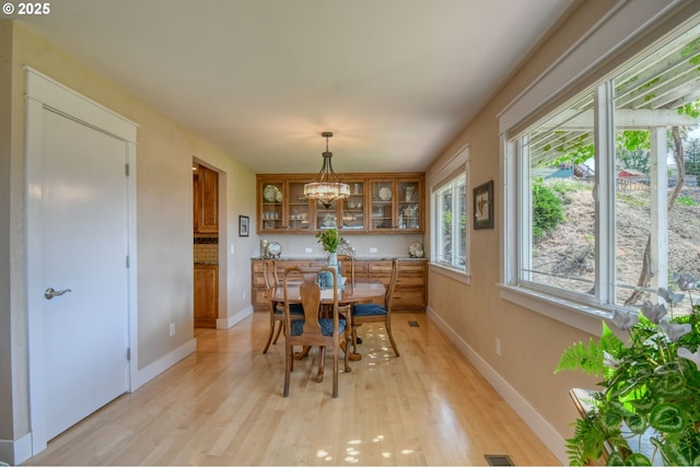 1329 NW Horn Ave, Pendleton, OR 97801 - dining area featuring light wood-type flooring and baseboards