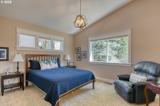 1329 NW Horn Ave, Pendleton, OR 97801 - carpeted bedroom featuring multiple windows, a chandelier, vaulted ceiling, and baseboards