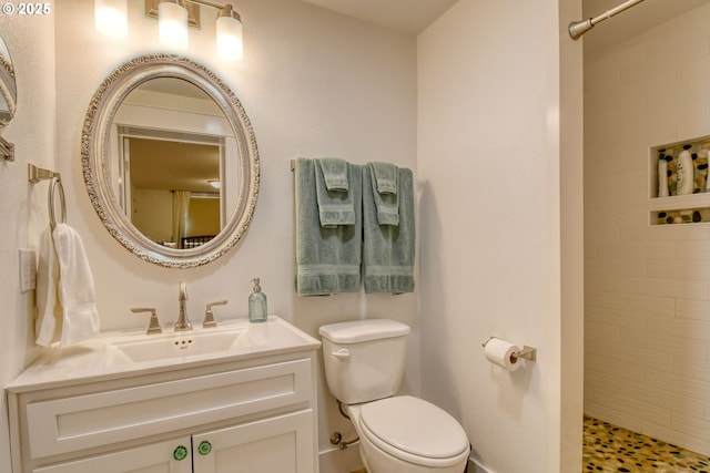 1329 NW Horn Ave, Pendleton, OR 97801 - bathroom featuring tiled shower, toilet, and vanity
