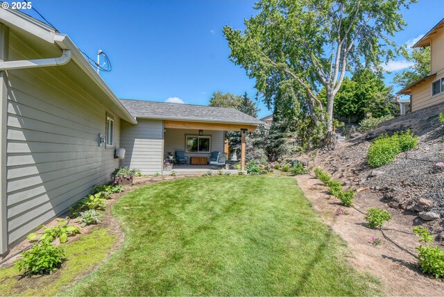 1329 NW Horn Ave, Pendleton, OR 97801 - view of green lawn with a patio area