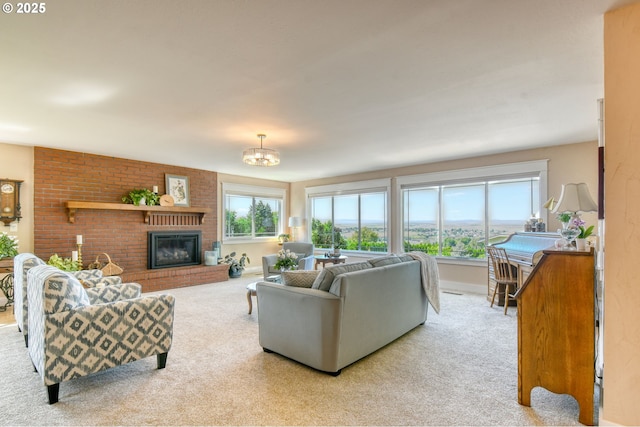 1329 NW Horn Ave, Pendleton, OR 97801 - living area with carpet, a brick fireplace, a chandelier, and baseboards