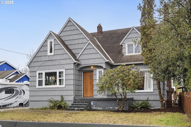 view of front of home with a front yard