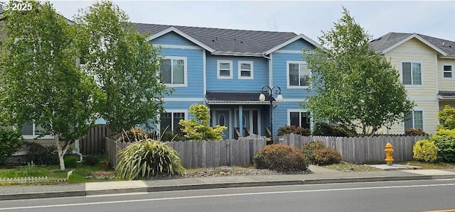 multi unit property featuring fence